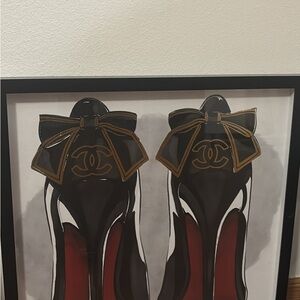 CHANEL Black and Gold Heels with Bow Accent